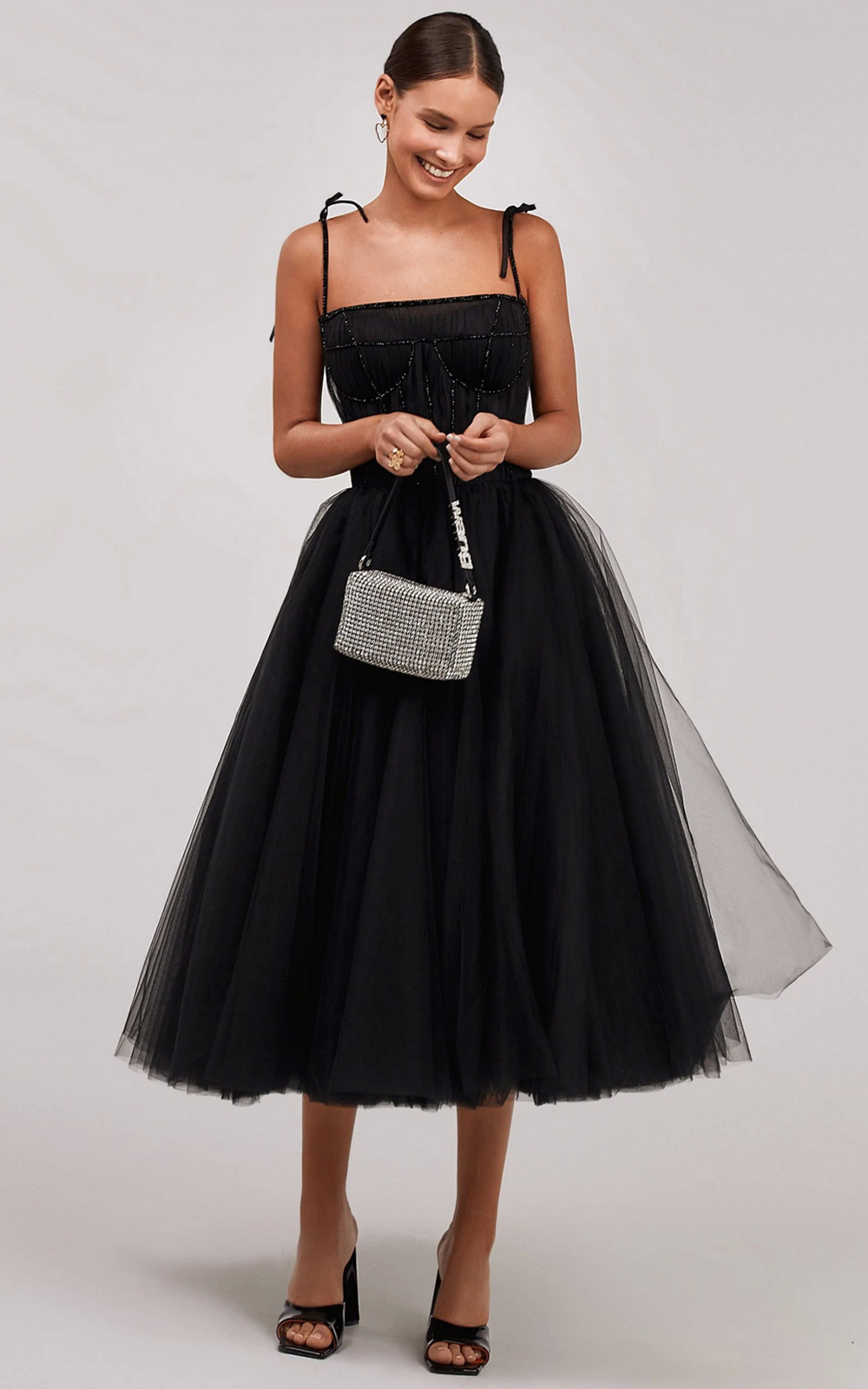 18 Black Wedding Guest Dress Ideas + FAQs